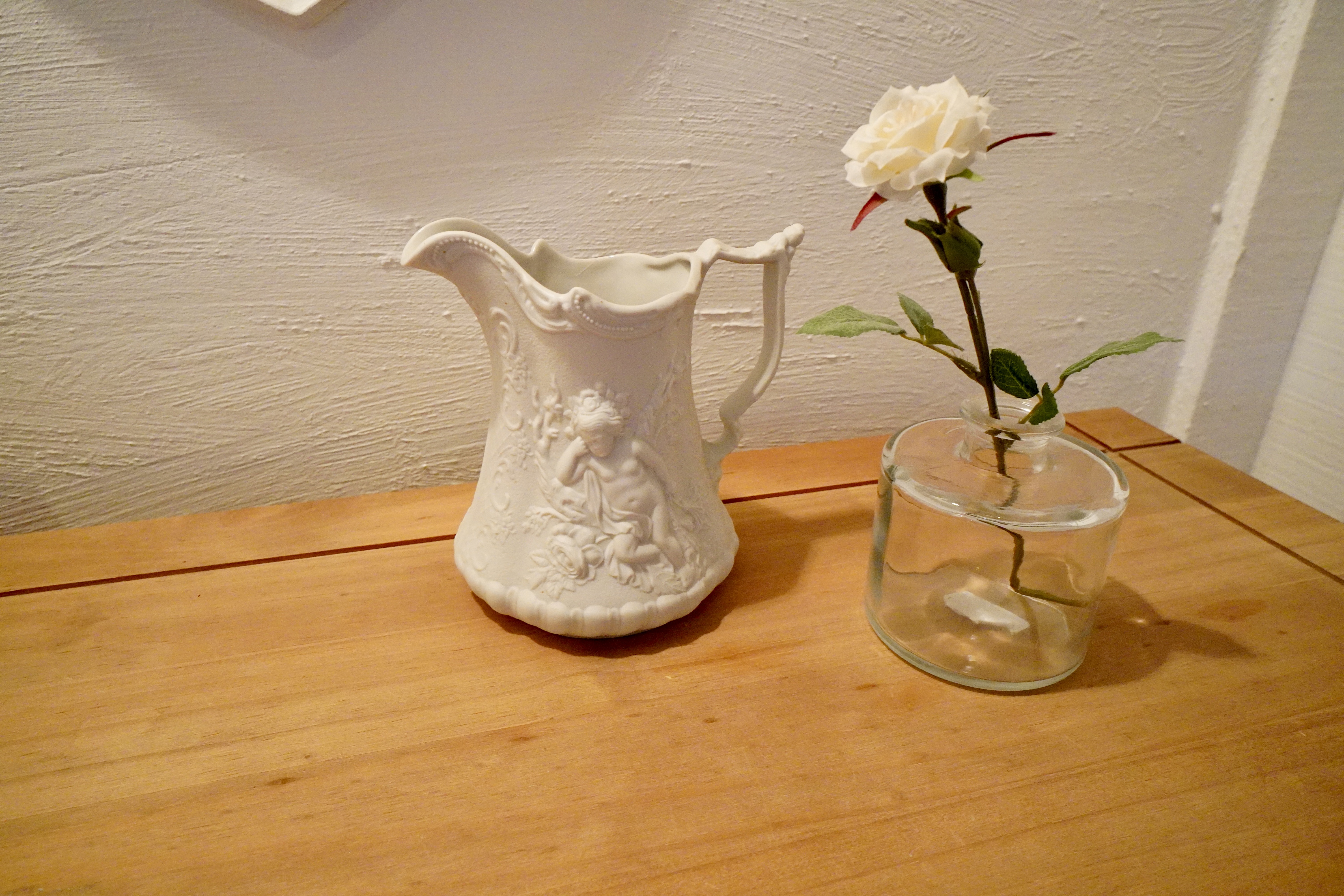 Jug and rose Jug and rose