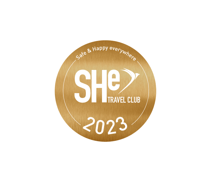 She travel club logo